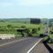 Rodovia Assis Chateaubriand - em primeiro plano viaduto sobre os trilhos da extinta FEPASA - ao fundo trevo secundário de Parapuã - sentido da foto: Sul-Norte - dezembro/2007
